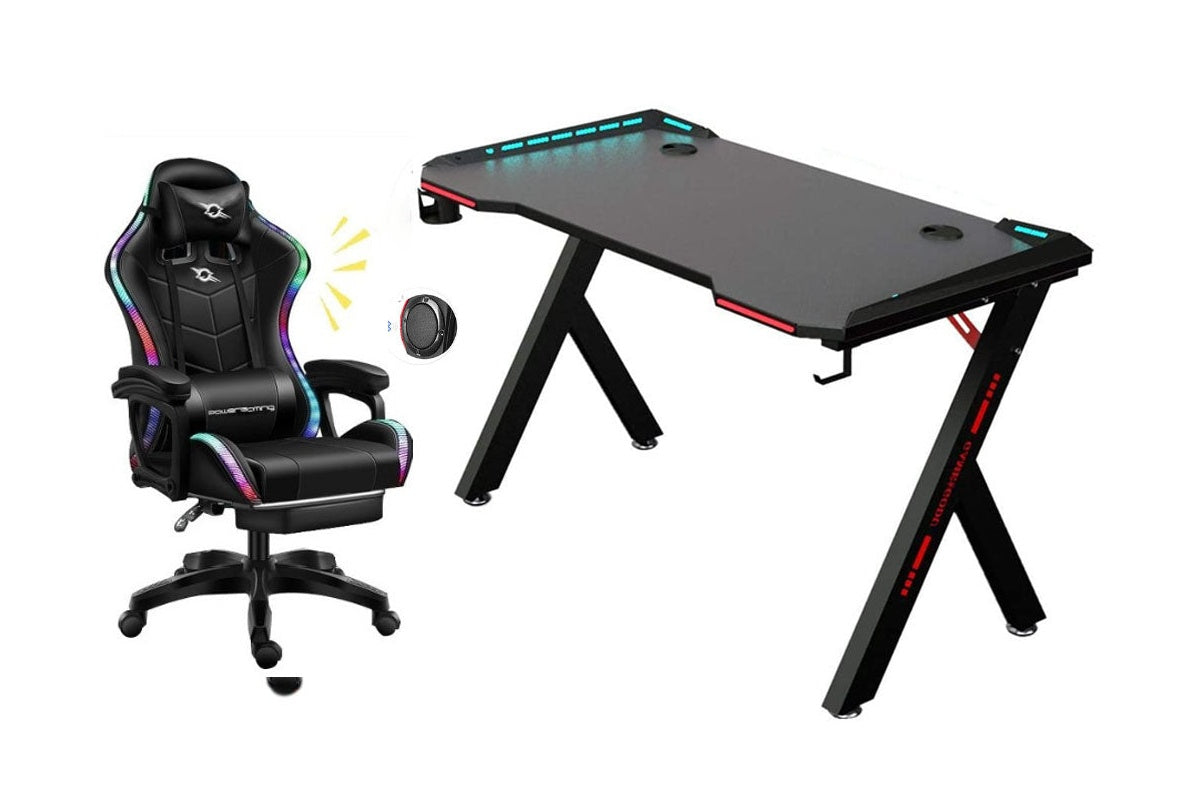 Gaming desk showing cable management holes