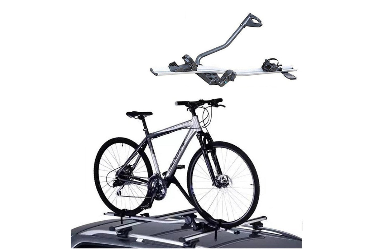 Bike mounted on roof rack carrier