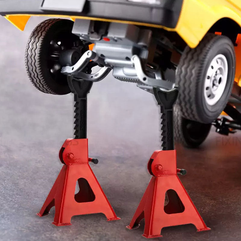 Axle stands supporting large vehicle