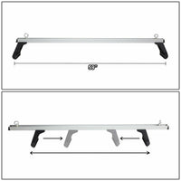 Thumbnail for Tie-down straps attached to car roof rack cross bar