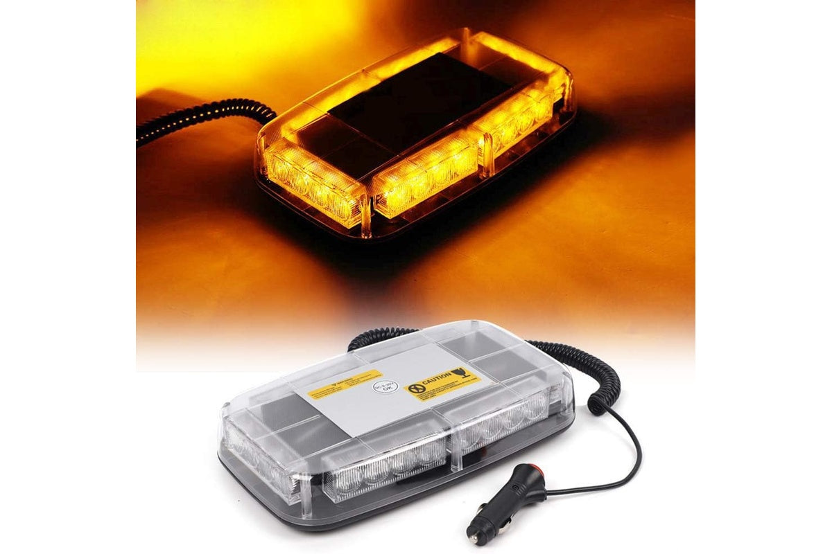 Amber beacon light glowing in low light