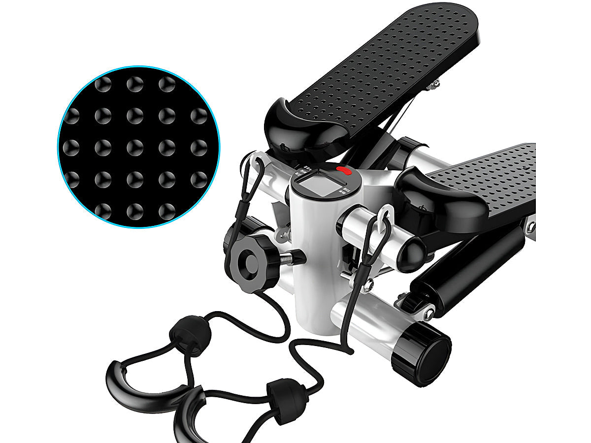 Side view of compact stepper on wooden floor