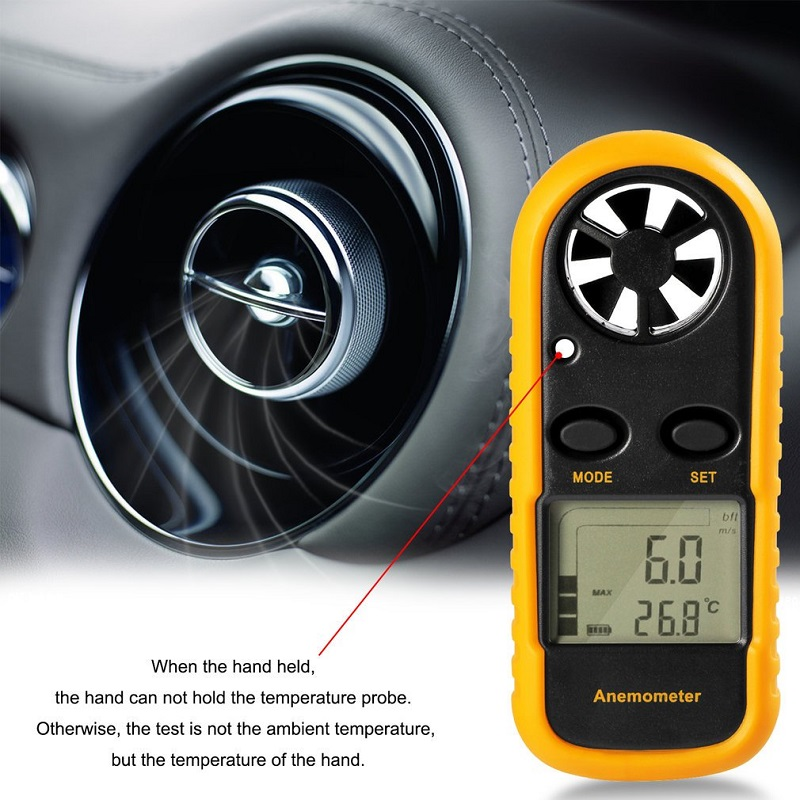 Compact yellow anemometer with lanyard attached