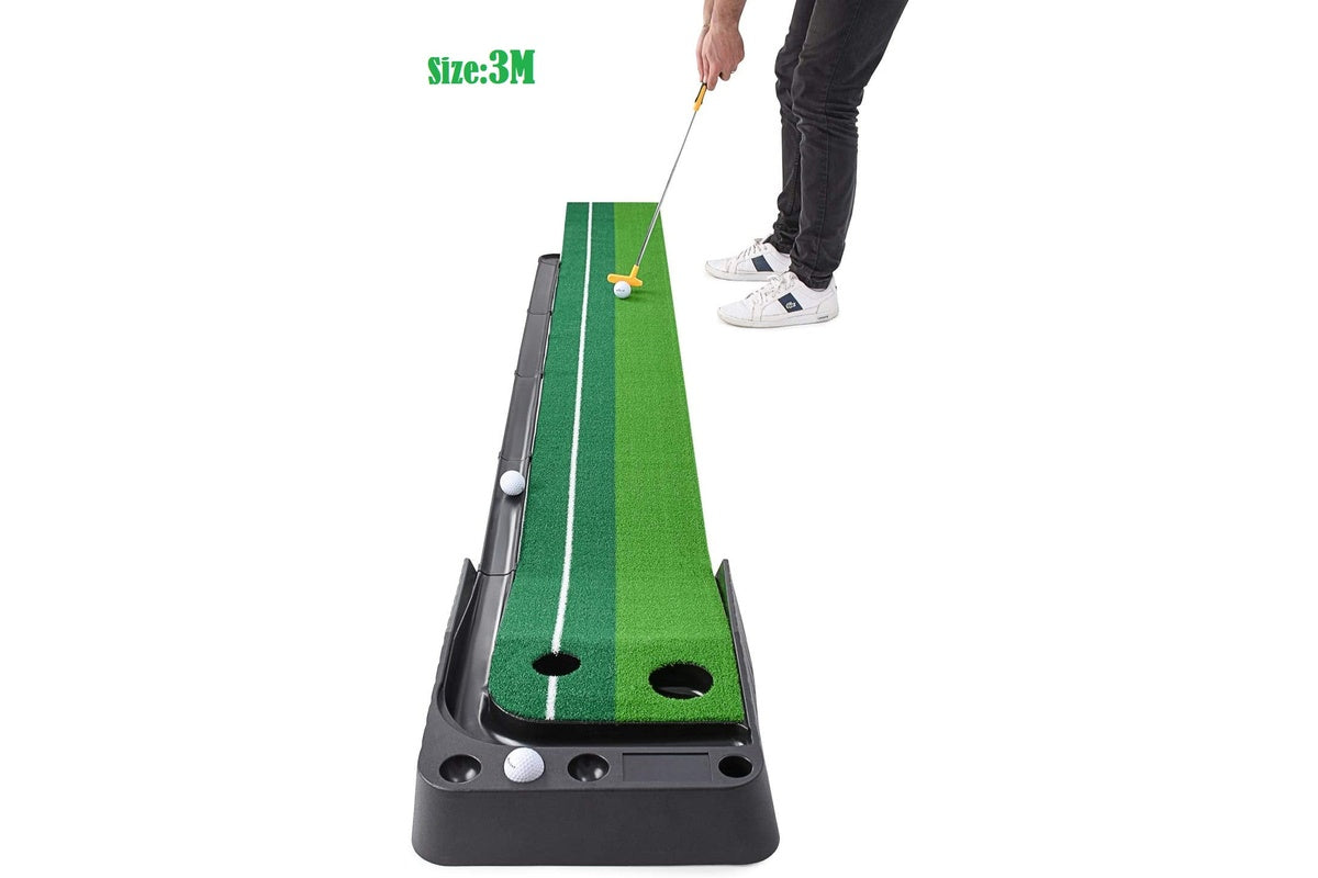 Golf practice set showing auto ball return feature