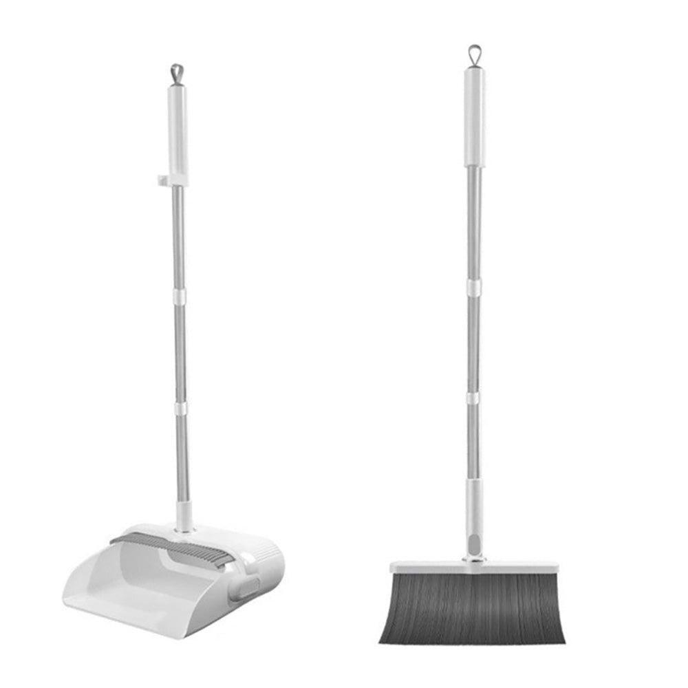 Broom sweeping dust on floor