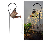 Thumbnail for Solar watering can light in outdoor setting