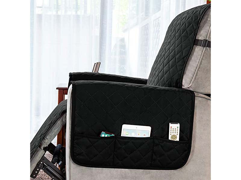 Recliner chair cover showing elastic straps for secure fit