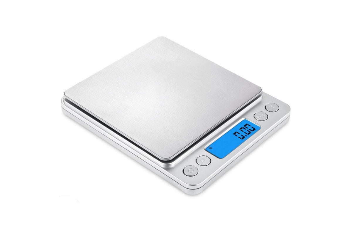 Digital scale with plastic trays for loose items