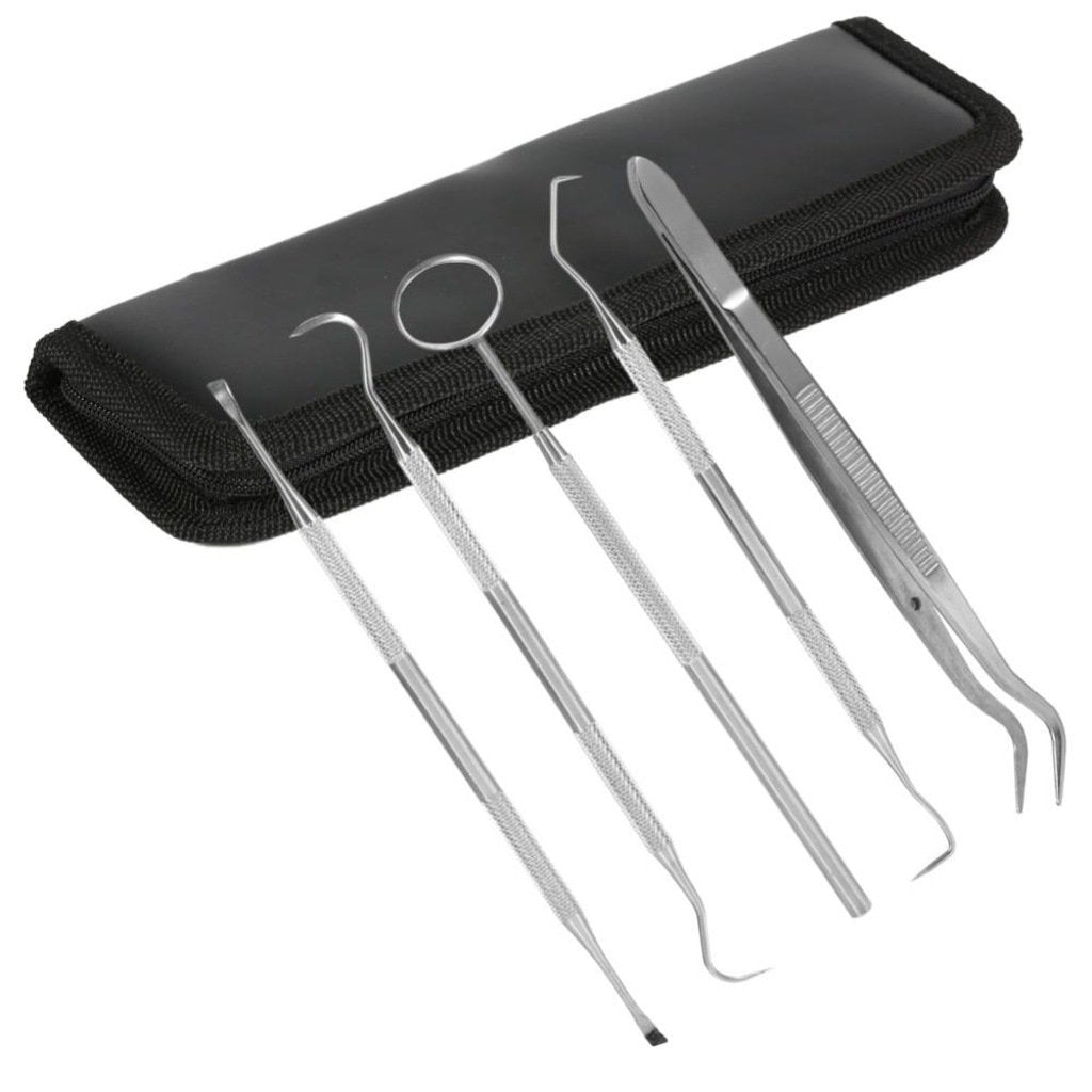Close-up of stainless steel dental mirror