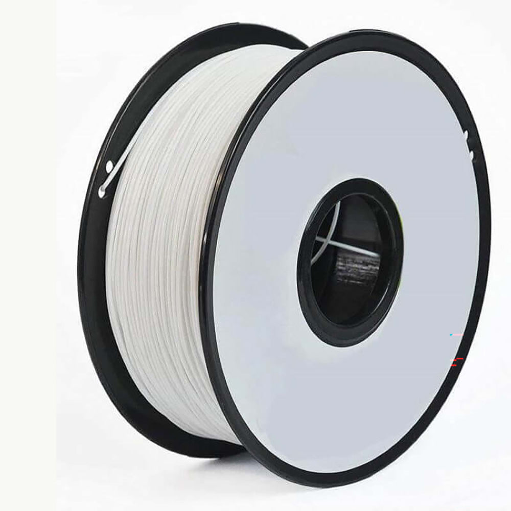 3D printer filament spool beside 3D printer nozzle