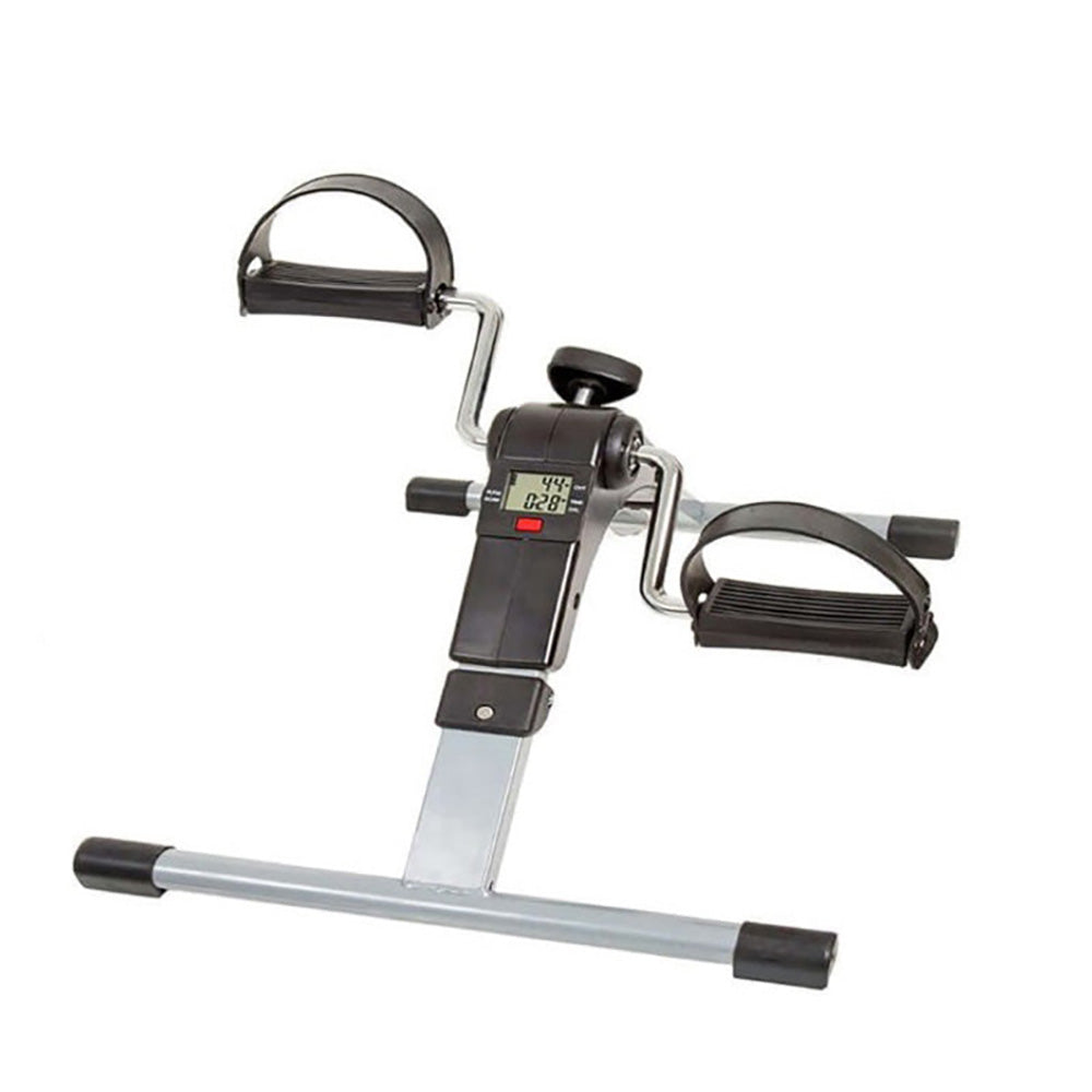 Pedal exerciser bike compact size next to chair