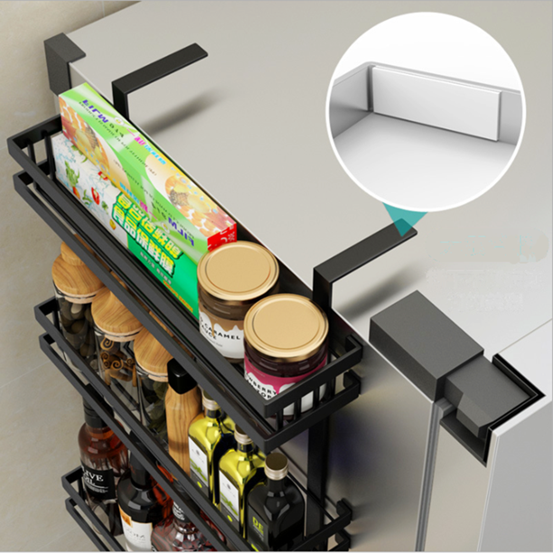 Kitchen organiser storage shelf holding spices and utensils