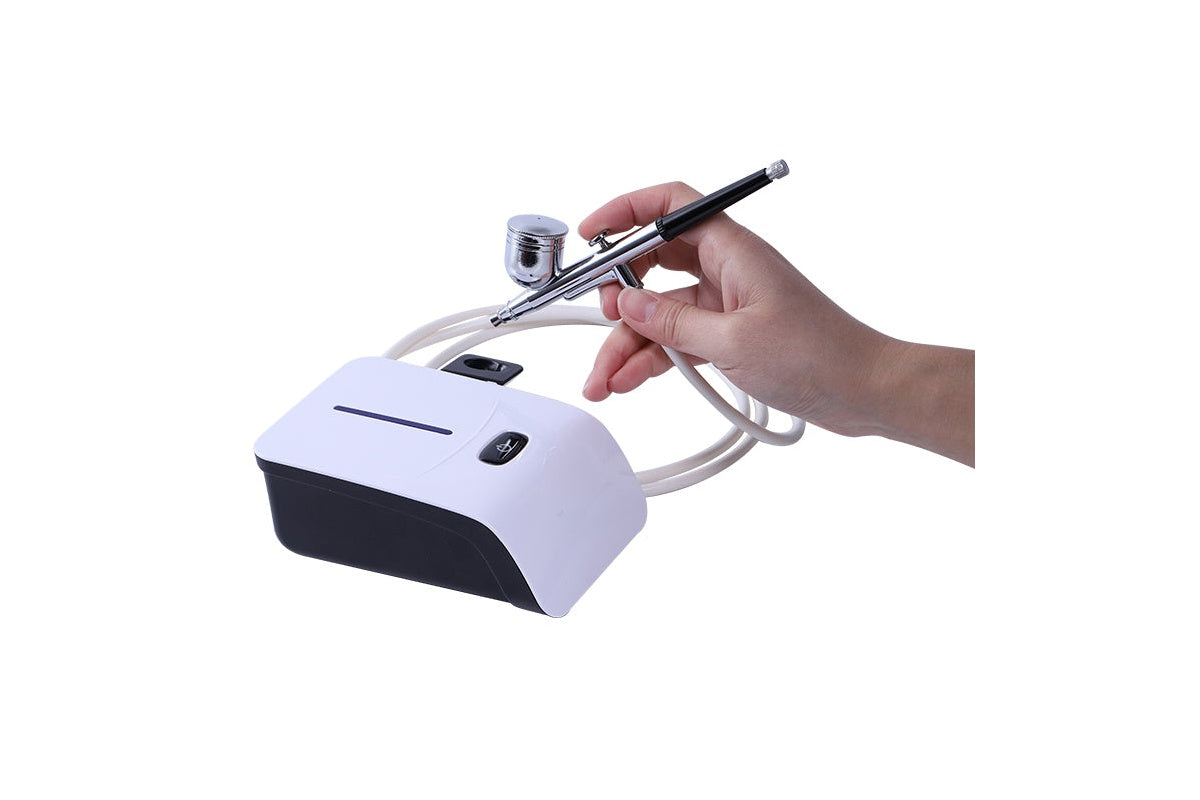 Mini airbrush compressor with adjustable pressure