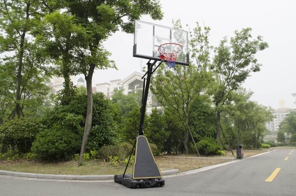 Basketball hoop assembled in backyard setting