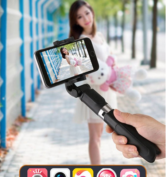 Selfie stick tripod in use