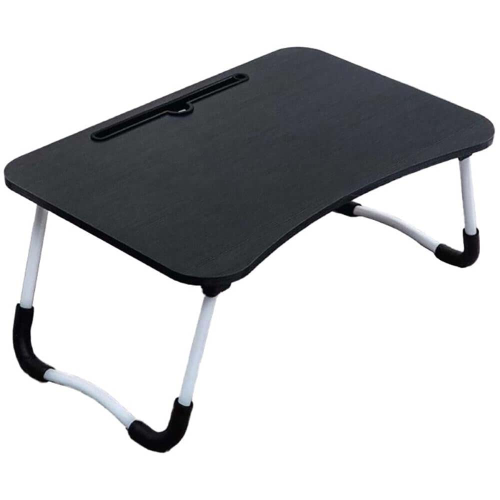 Folded laptop table stored behind door