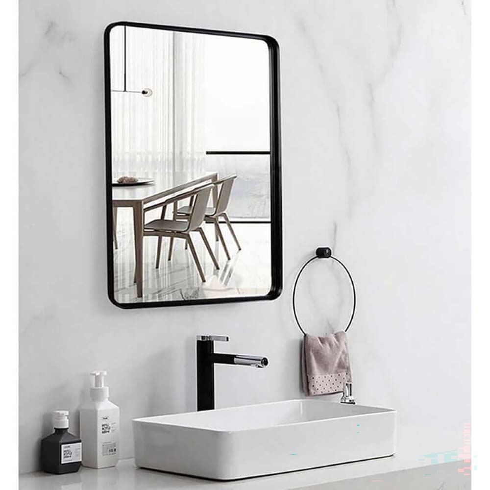 Bathroom mirror with gold aluminium frame detail