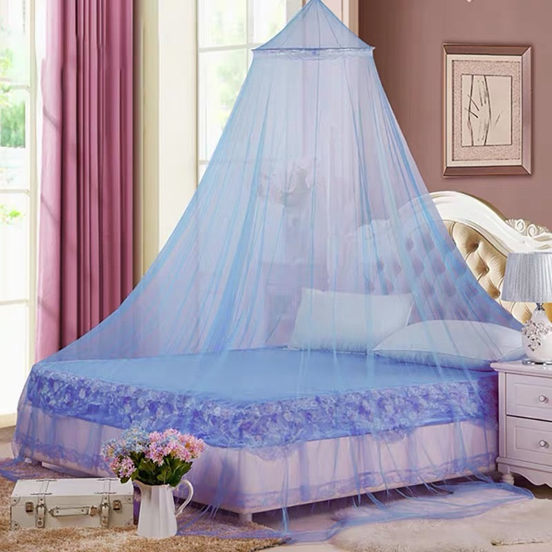 Mosquito net canopy hanging from ceiling