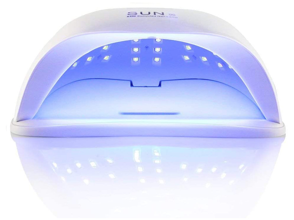 Compact nail dryer UV lamp size comparison with hand