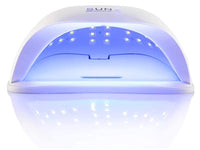 Thumbnail for Compact nail dryer UV lamp size comparison with hand