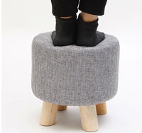 Thumbnail for Grey ottoman footstool in modern living room