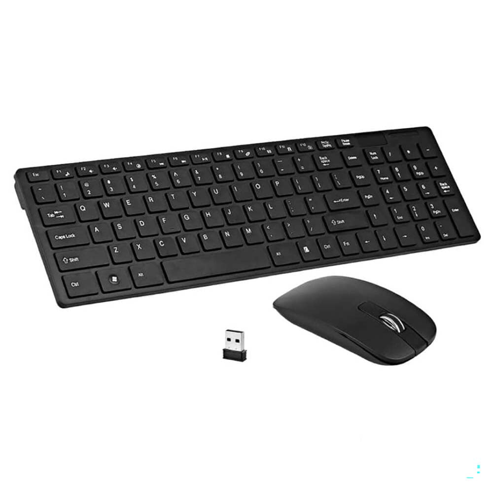 Wireless keyboard and mouse combo used on wooden desk