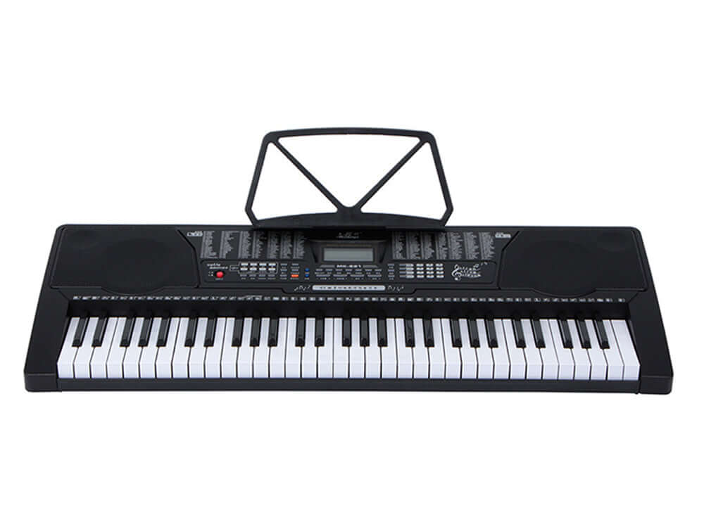 Keyboard piano with audio input jack visible
