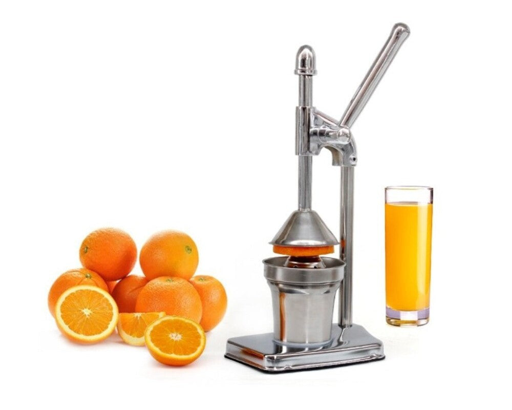 Juicer pressing citrus fruit for fresh juice