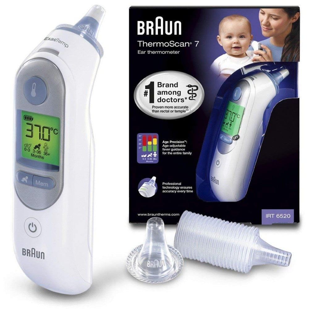 Thermometer in use on child ear