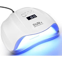 Thumbnail for Nail dryer UV lamp showing power adapter included