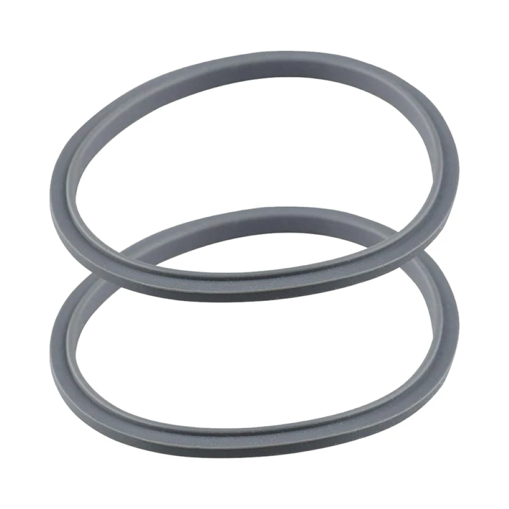 Top view of two grey Nutribullet blade gasket seals