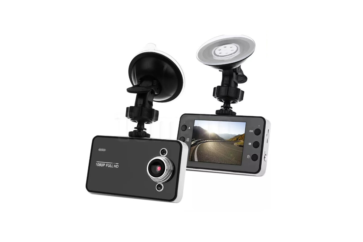 Side angle of car dash camera showing lens and buttons
