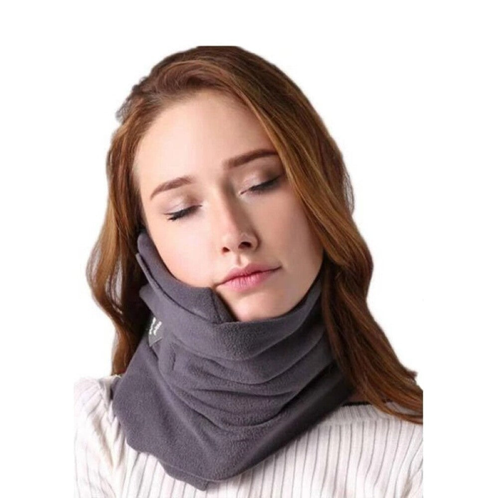 Travel pillow on airplane seat headrest