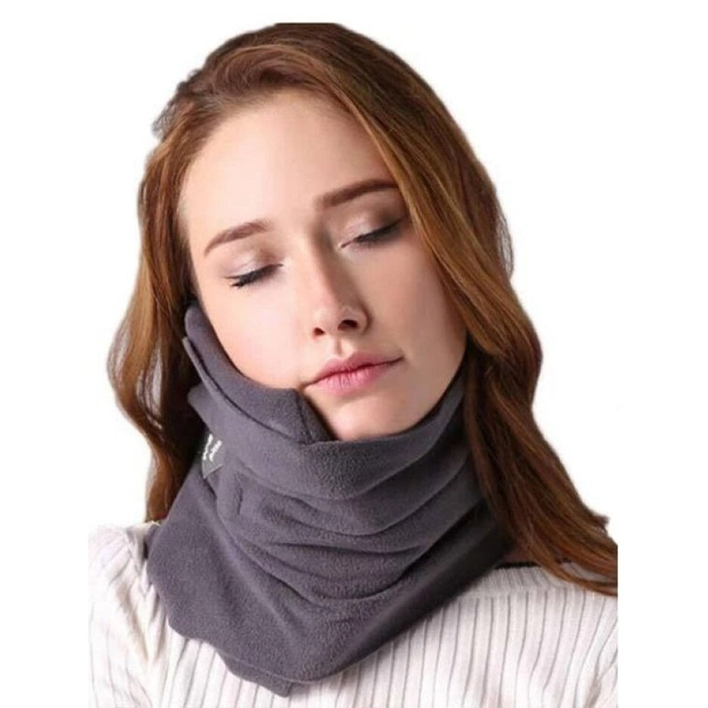 Grey travel pillow with carry strap