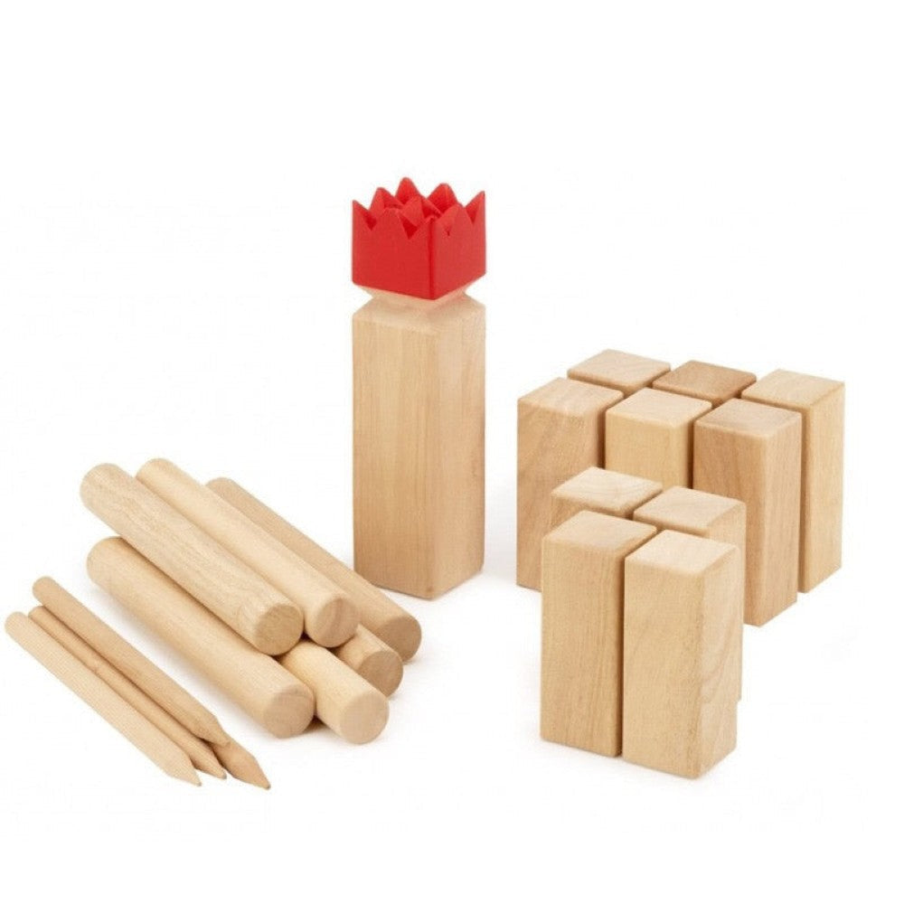 Players tossing dowels during Kubb game