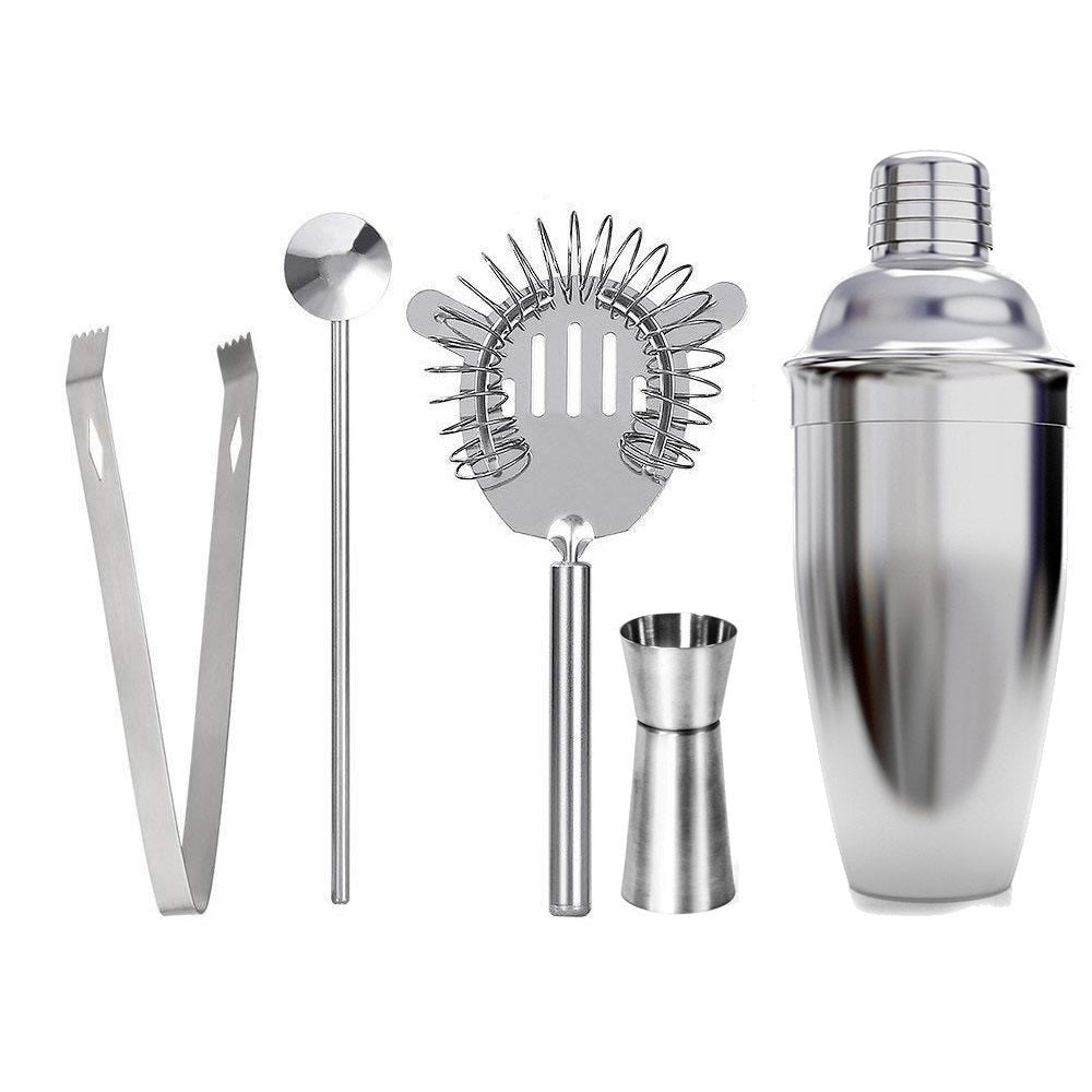 Cocktail shaker set components laid out on bench