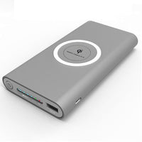 Thumbnail for Power bank charging phone wirelessly on flat surface