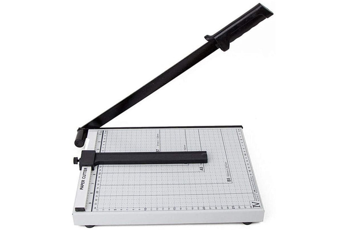 Side view of paper cutter with adjustable paper guide