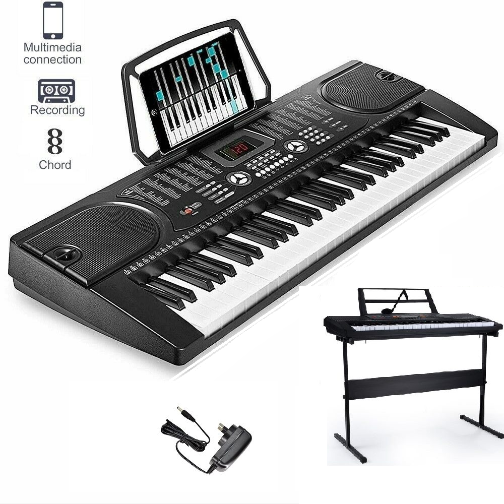 61 key electronic keyboard piano with microphone attached