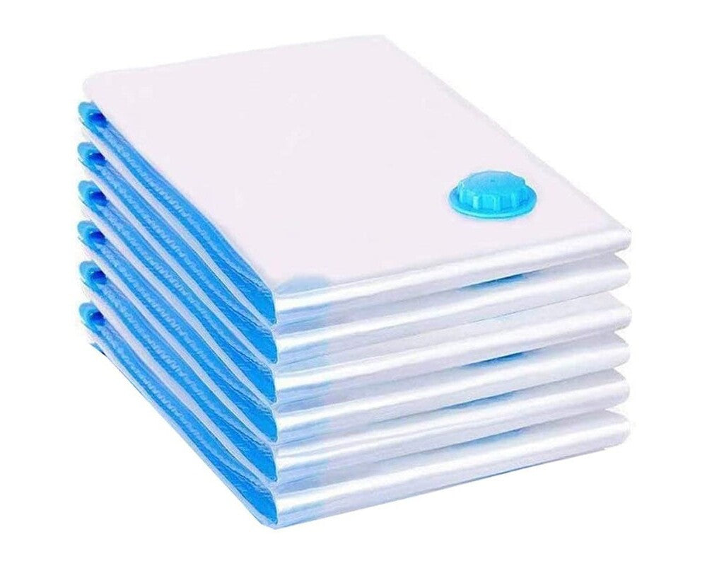 Stacked vacuum bags saving wardrobe space