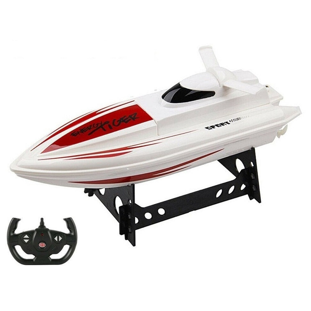 Red white RC boat on water surface