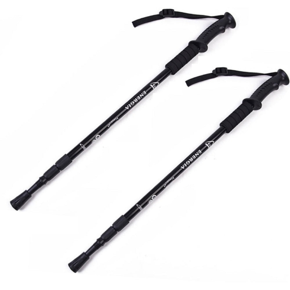 Black trekking poles packed small for backpack storage