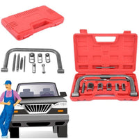 Thumbnail for Valve spring compressor kit laid out on workbench