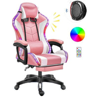 Thumbnail for Pink gaming chair with footrest extended and padded seat