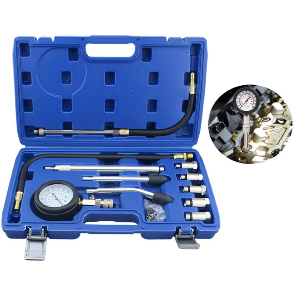 Compression tester kit laid out with manual
