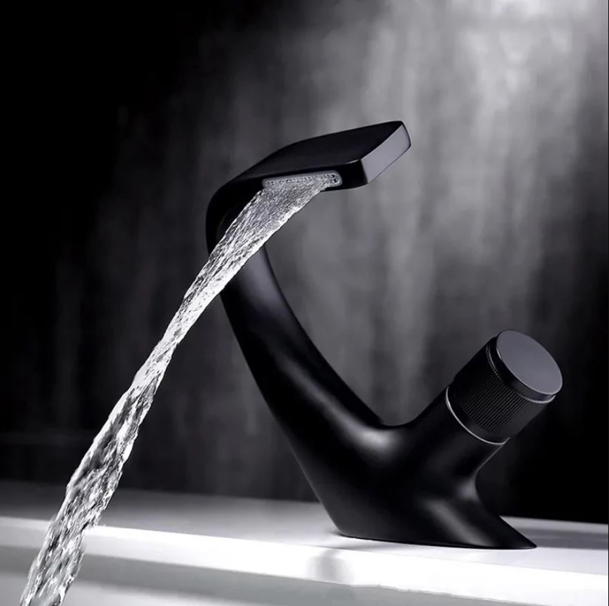 Side view of brass kitchen mixer tap