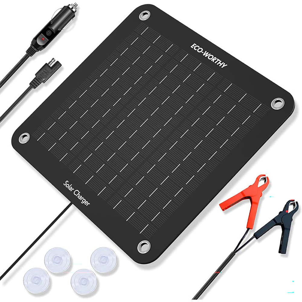 Solar panel kit 12V 10W in outdoor setting on grass