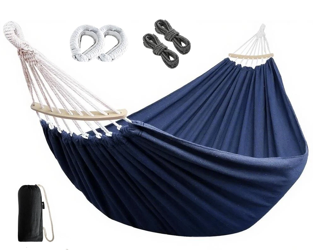Double hammock setup for two adults in backyard