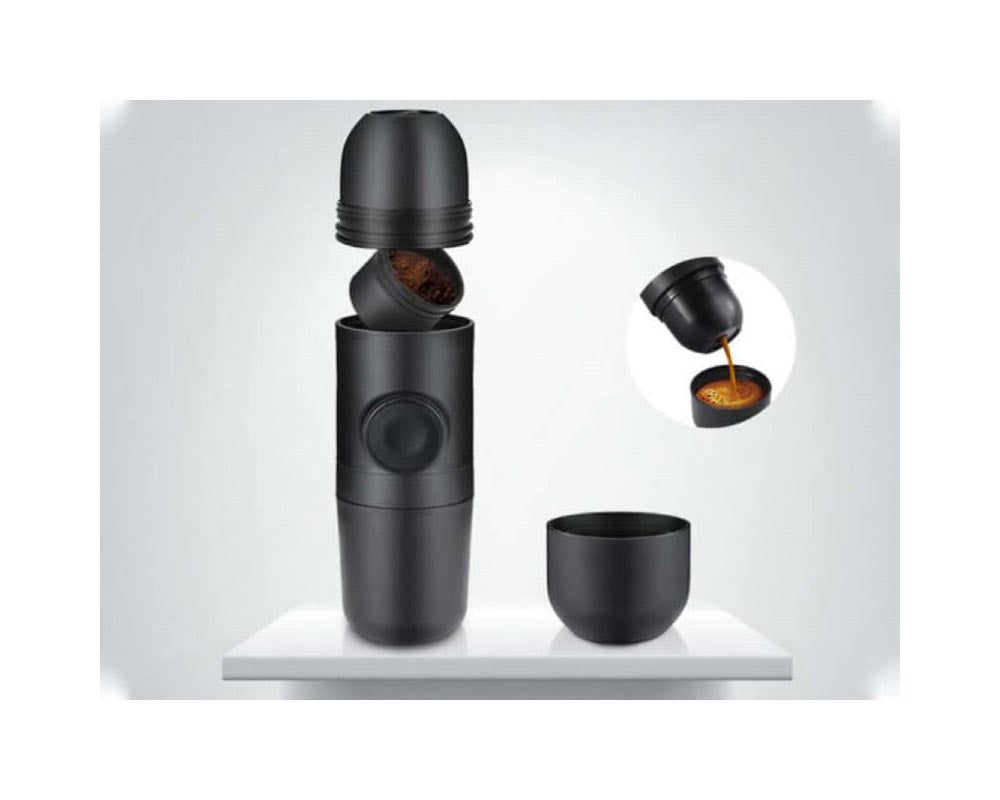 Hand-pressed espresso maker with coffee powder compartment