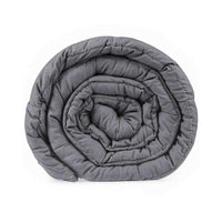 Thumbnail for Weighted blanket draped over chair for relaxation